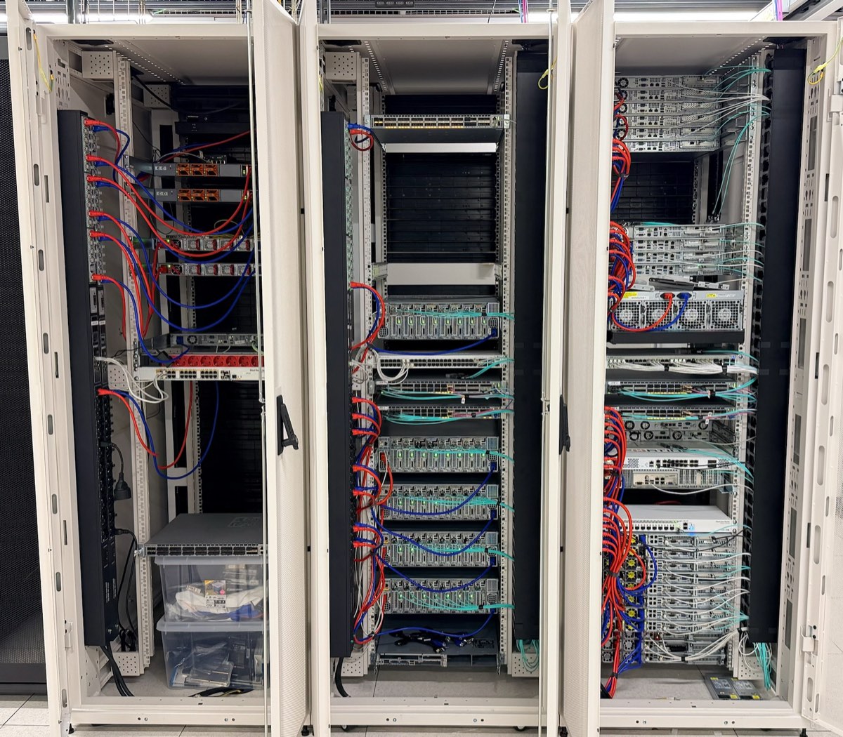 GINERNET's own racks with servers and network cabling at the Digital Realty datacenter in Madrid
